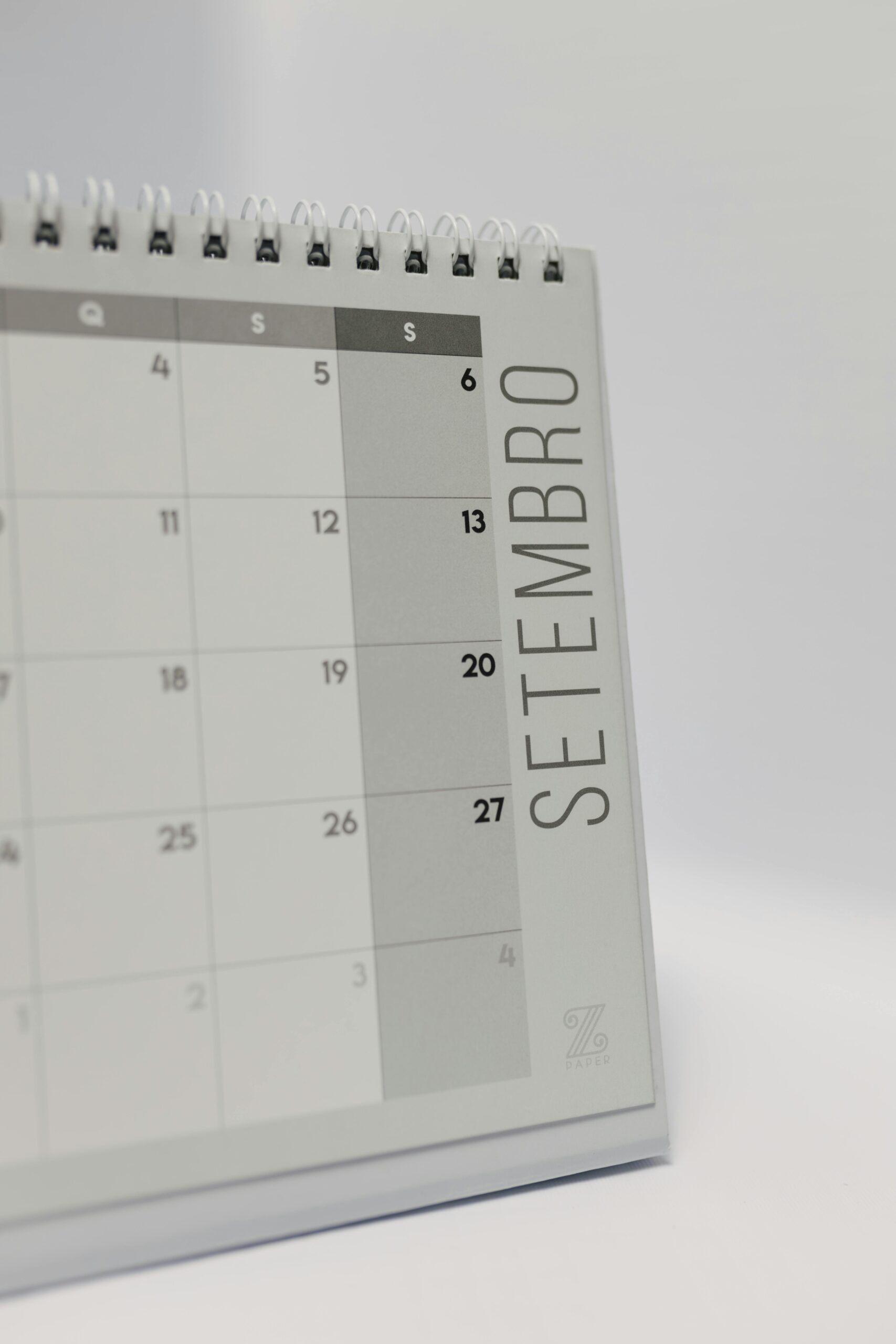 Close-up of a minimalist September calendar page in grayscale tones.